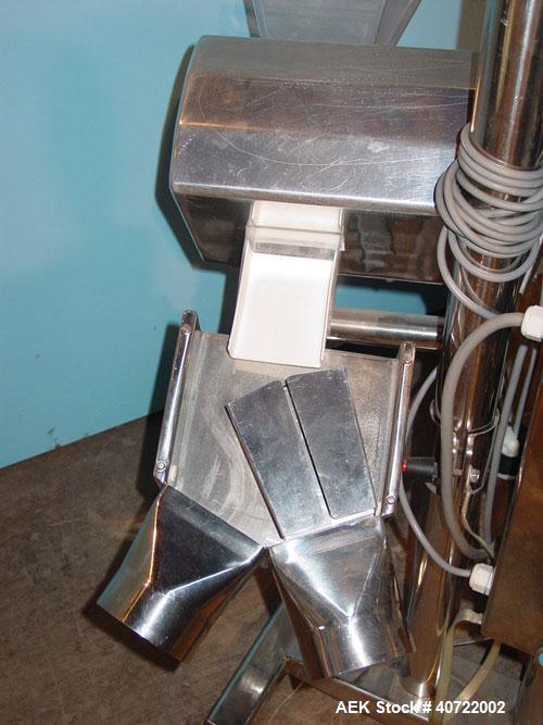 Used Safeline Drop Though Metal Detector, model Tablex 600KHz. 3 1/2" wide x 1" high aperture, 4 1/2" x 6" plastic chute infeed. Dual discharge with swinging reject diverter. Mounted on a stainless s...