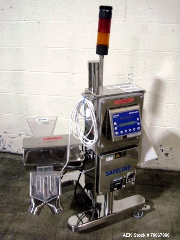 Used Safline metal detector, 3.75" x 1.5" aperature, with diverter, on stainless steel stand, serial # 78731.  NOTE: PRICE INCLUDES A 15% BUYERS PREMIUM.