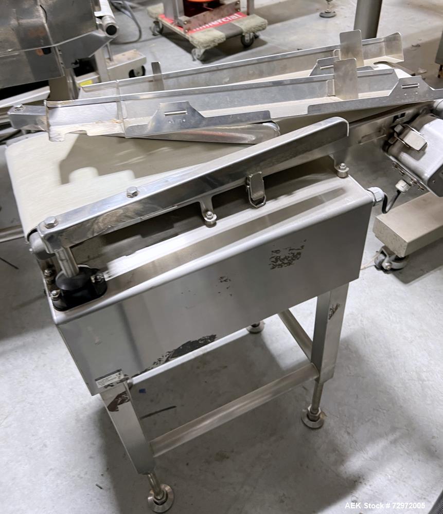 Used- Anritsu Model KD7405AW X-Ray Metal Detector. Max product weight 5Kg (60/m/min). Max product size: 240mm (width) x 120M...