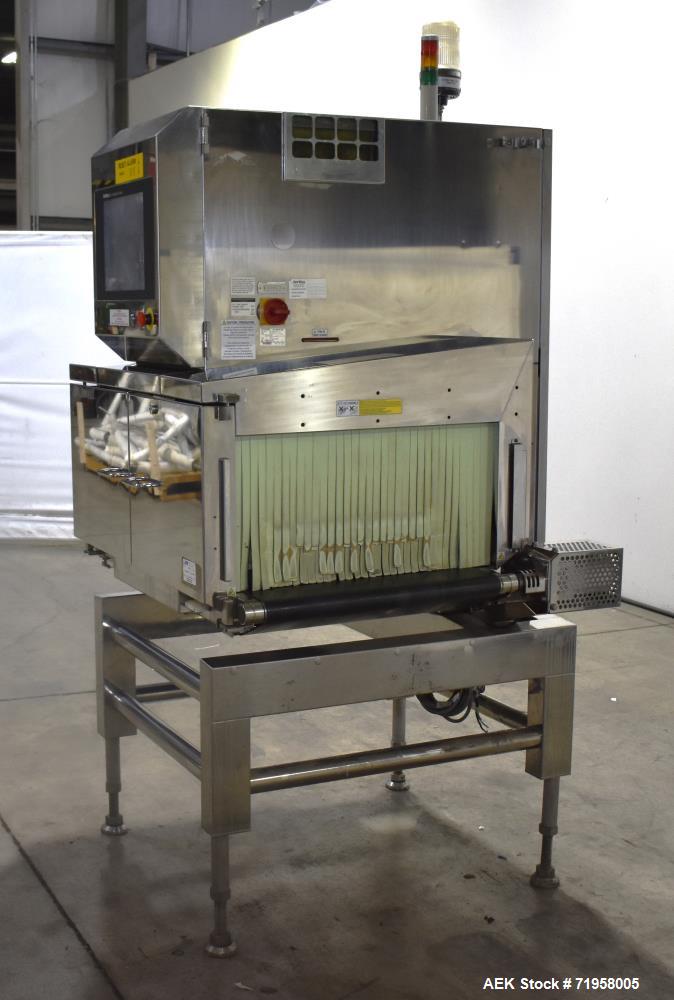 Used Anritsu X-Ray Inspection System, Model KD74. Approximate 27-1/2" W x 14" H product opening with approximate 24-1/2" W belt. Product weight maximum 50kg / 110 lbs. (35m/min). Product size maximum...