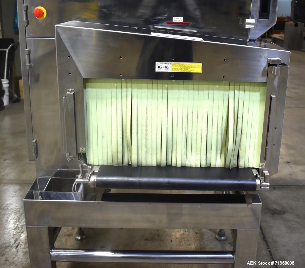 Used Anritsu X-Ray Inspection System, Model KD74. Approximate 27-1/2" W x 14" H product opening with approximate 24-1/2" W belt. Product weight maximum 50kg / 110 lbs. (35m/min). Product size maximum...