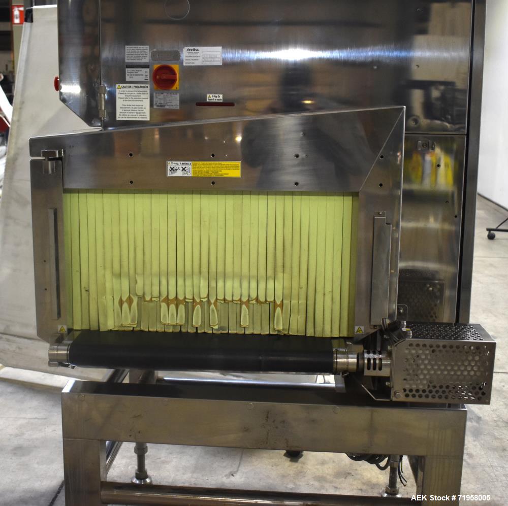 Used Anritsu X-Ray Inspection System, Model KD74. Approximate 27-1/2" W x 14" H product opening with approximate 24-1/2" W belt. Product weight maximum 50kg / 110 lbs. (35m/min). Product size maximum...