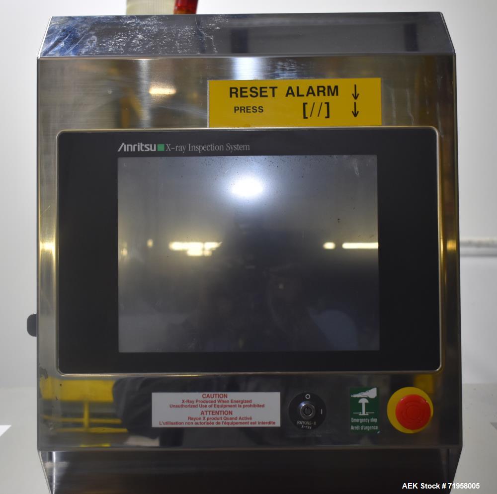 Used Anritsu X-Ray Inspection System, Model KD74. Approximate 27-1/2" W x 14" H product opening with approximate 24-1/2" W belt. Product weight maximum 50kg / 110 lbs. (35m/min). Product size maximum...