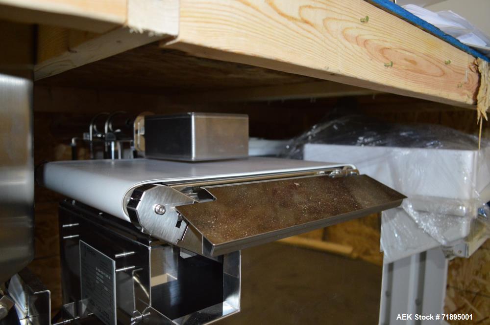 Used Ishida X-Ray Inspection System, Model IXGA2475. Max X Ray Output 300 W. Speed 10 - 60 m/min. Conveying weight 2 kg over entire length. Inspection chamber: length 20-450 mm intermittent flow. Wid...