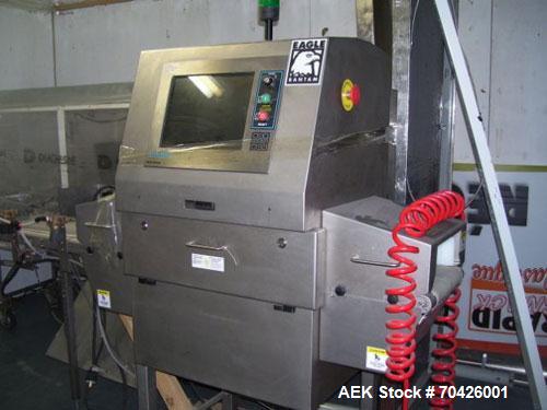 Used Smiths Heimann Eagle Bantam MK2 X-Ray Inspection System with reject system. 9" Wide x 4" tall opening. Manufactured 2005.