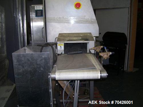 Used Smiths Heimann Eagle Bantam MK2 X-Ray Inspection System with reject system. 9" Wide x 4" tall opening. Manufactured 2005.