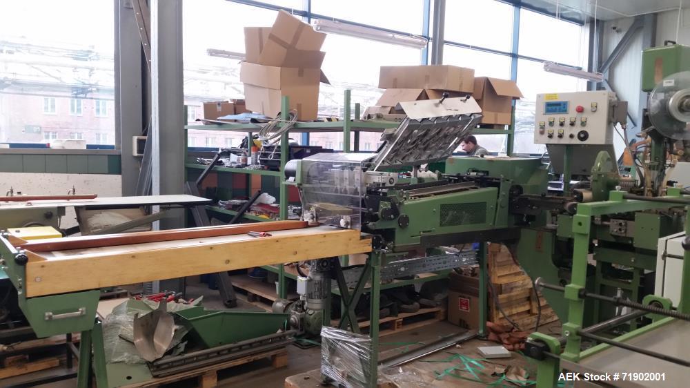 Used- JCigar Spiral Wrap Roll Combination Unit. Includes: Inclined feeder unit, hopper and feed unit, spiral roll unit with ...
