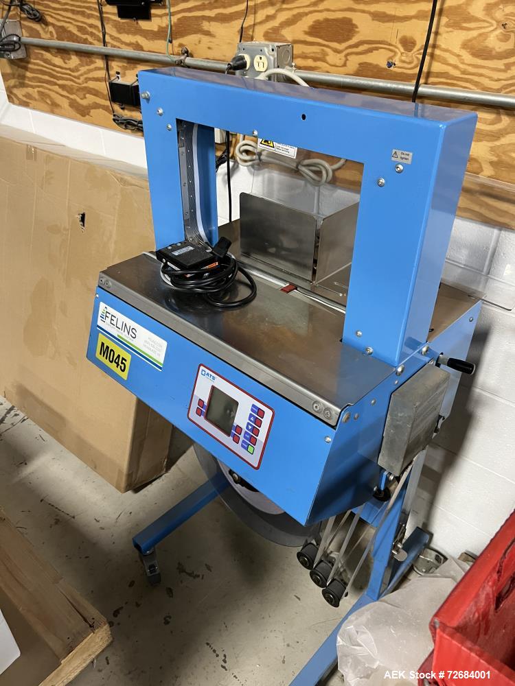 Used ATS-Tanner Banding Systems Ultrasonic Unique Banding Machine, Model US-2000 AD. Arch width 260mm to 900mm, Arch height 180mm to 500mm, band widths 20, 30, 50, 60mm, air supply 6 bar, type of mat...
