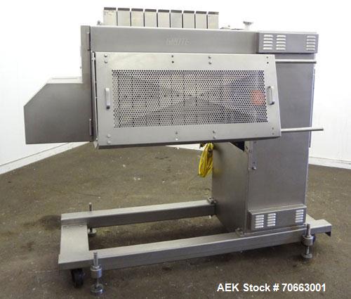 Used Grote Model S/A-530 Single Lane Slicer/Applicator. Machine is rated at up to 176 strokes per minute per lane. Unit also bulk slices, stacks and shingles. Maximum slice rate in stack or shingle m...