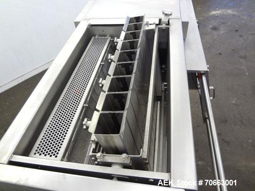 Used Grote Model S/A-530 Single Lane Slicer/Applicator. Machine is rated at up to 176 strokes per minute per lane. Unit also bulk slices, stacks and shingles. Maximum slice rate in stack or shingle m...