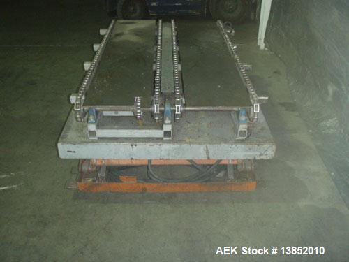 Used Olympic Material Handling pallet conveyor with hydraulic lift. Drag chain pallet conveyor with hydraulic scissor lift. Year 2002. 4,000 lb capacity. 3 hp, 460 volts, 3.8 amps. Overall 6' long x ...