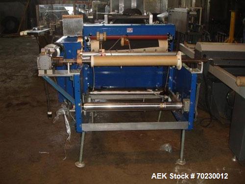 Used Rosenthan Sheetmaster Sheeter. 36" Wide, rated up to 130 FPM with dancer rool and output table. NOTE PRICE INCLUDES A 15% BUYER PREMIUM.