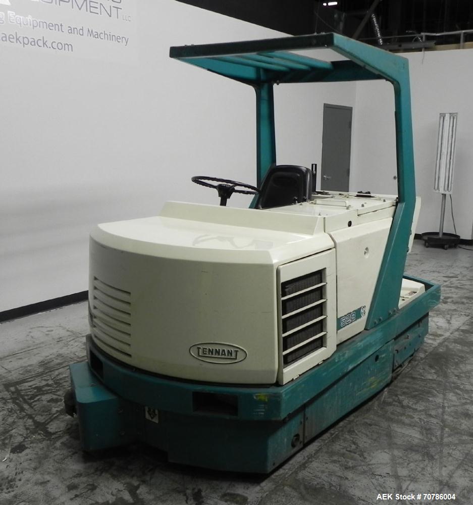 Used Tennant Model 528 SRS Edition Riding Floor Scrubber. Has a 4-cycle propane powered engine. Has 122 gallon solution tank and 4.9 gallon cleaning solution tank. Has (1) 11" and (1) 13" scrub brush...