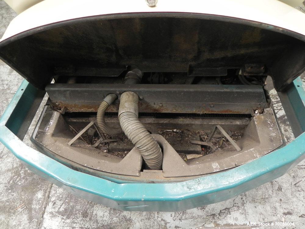 Used Tennant Model 528 SRS Edition Riding Floor Scrubber. Has a 4-cycle propane powered engine. Has 122 gallon solution tank and 4.9 gallon cleaning solution tank. Has (1) 11" and (1) 13" scrub brush...