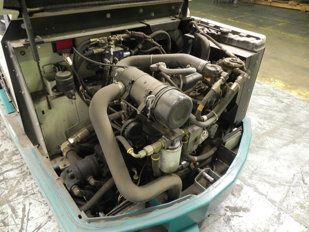 Used Tennant Model 528 SRS Edition Riding Floor Scrubber. Has a 4-cycle propane powered engine. Has 122 gallon solution tank and 4.9 gallon cleaning solution tank. Has (1) 11" and (1) 13" scrub brush...