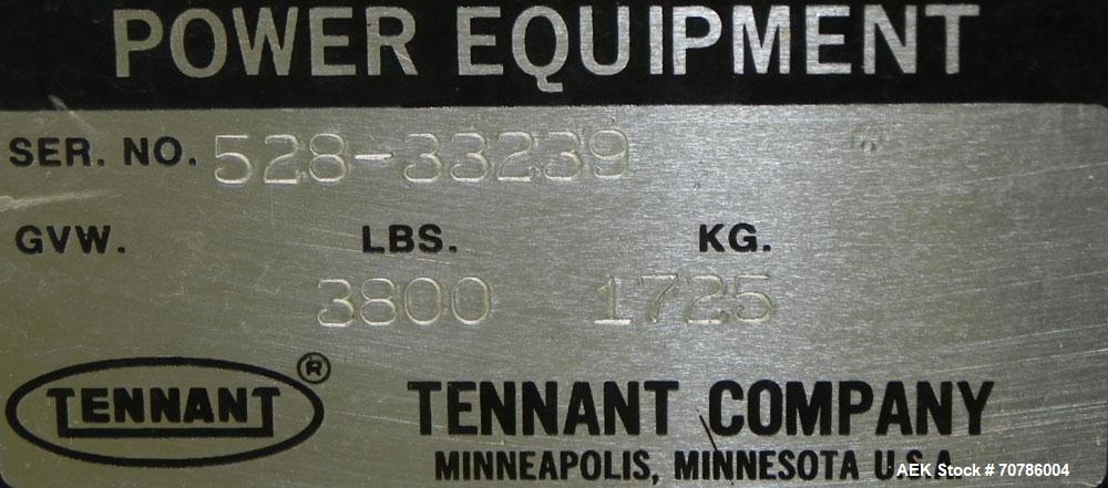 Used Tennant Model 528 SRS Edition Riding Floor Scrubber. Has a 4-cycle propane powered engine. Has 122 gallon solution tank and 4.9 gallon cleaning solution tank. Has (1) 11" and (1) 13" scrub brush...