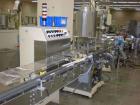 Used: Lakso model 71 automatic twin head cottoner capable of speeds up to 200 BPM. Has screw infeed automatic bottle .Has factory controls, 