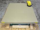 Used Southworth Systems Pallet Lift. Machine is rated at a 2000 lb capacity. Has a lift area of 48