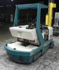 Used Tennant Model 528 SRS Edition Riding Floor Scrubber. Has a 4-cycle propane powered engine. Has 122 gallon solution tank and 4.9 gallon cleaning solution tank. Has (1) 11