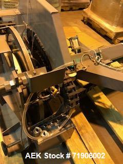 Unused- ABC, Model 72A Case Palletizer. Has product timing infeed conveyor, 25" wide row forming conveyor with case turner. Standard row pusher. Low friction roller transfer table. Main frame with el...