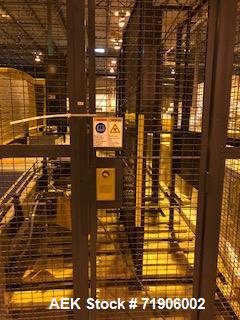 Unused- ABC, Model 72A Case Palletizer. Has product timing infeed conveyor, 25" wide row forming conveyor with case turner. Standard row pusher. Low friction roller transfer table. Main frame with el...