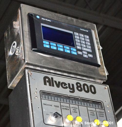 Used Alvey Model 800 Automatic Palletizer. Capable of speeds up to 75 cases per minute. Has Allen Bradley Micrologixs PLC controls, last running 40 x 48 pallets. Has pallet feeder, compact design.