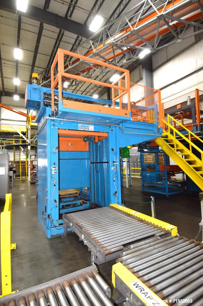 Used- Lambert Material Handling 1200 Fully Automatic Bag Palletizer. Speeds up to 50 cases per minute based on layer pattern...