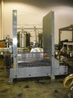 Used Alvey 680 Low Level Palletizer. Capable of speeds up to 35 cases per minute. Case size range: (Length) 6