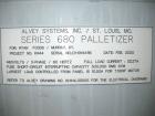 Used Alvey 680 Low Level Palletizer. Capable of speeds up to 35 cases per minute. Case size range: (Length) 6