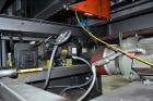 Used Alvey Model 800 Automatic Palletizer. Capable of speeds up to 75 cases per minute. Has Allen Bradley Micrologixs PLC controls, last running 40 x 48 pallets. Has pallet feeder, compact design.