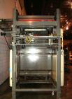 Used Alvey Model 800 Automatic Palletizer. Capable of speeds up to 75 cases per minute. Has Allen Bradley 504 PLC controls, last running 40 x 48 pallets. Has pallet feeder, compact design.