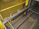 Used Columbia Model FL100 Automatic Low Level  Case Palletizer.