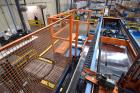 Used Lambert Material Handling 1200 Fully Automatic Bag Palletizer. Speeds up to 50 cases per minute based on layer pattern, load capacity 600 pounds per layer, Maximum load capacity 4000 at 70