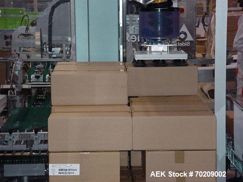 Used Cermex Sidel P922 Gantry Style Palletizer capable of speeds up to 12 cycles per minute. Has 4 axis gripping transfer station. Allen Bradley controls. Unit was installed and never put into produc...