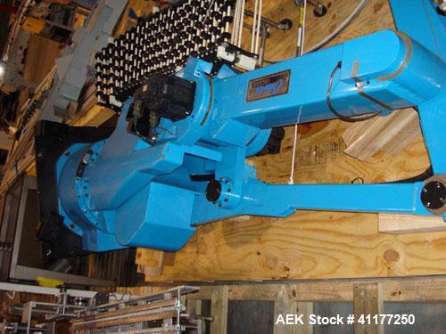 Used Columbia Okura 4 Axis Robotic Style Full Case or Bag Palletizer, Model A730. Capable of speeds up to 550 CPH or 700 BPH. Load capacity: rated 176 lb or 80 Kg, max 260 lb or 120 Kg. Has AB PLC co...