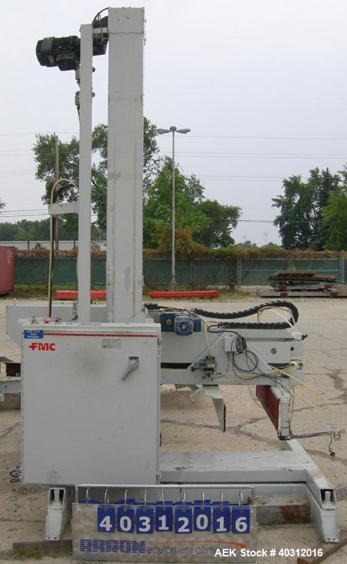 Used FMC Case Palletizer, model EZY150. Single axis, accepts approximate case maximum 24" high x 24" wide x 48" long. Equipped with 10’ conveyor section containing pallet magazine for auto pallet fee...