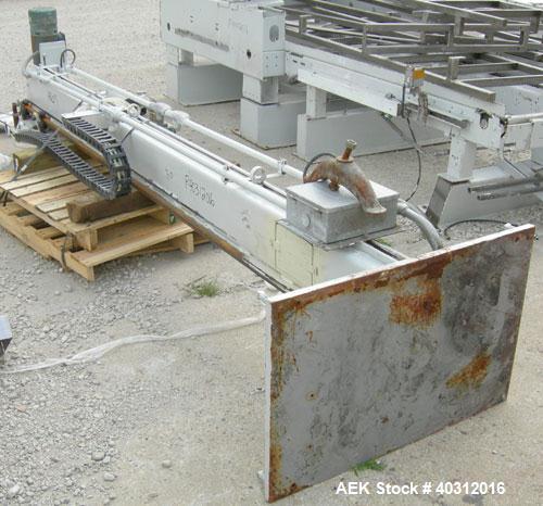 Used FMC Case Palletizer, model EZY150. Single axis, accepts approximate case maximum 24" high x 24" wide x 48" long. Equipped with 10’ conveyor section containing pallet magazine for auto pallet fee...
