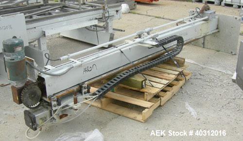 Used FMC Case Palletizer, model EZY150. Single axis, accepts approximate case maximum 24" high x 24" wide x 48" long. Equipped with 10’ conveyor section containing pallet magazine for auto pallet fee...