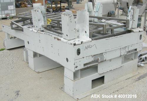 Used FMC Case Palletizer, model EZY150. Single axis, accepts approximate case maximum 24" high x 24" wide x 48" long. Equipped with 10’ conveyor section containing pallet magazine for auto pallet fee...