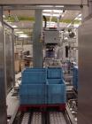 Used Cermex Sidel P922 Gantry Style Palletizer capable of speeds up to 12 cycles per minute. Has 4 axis gripping transfer station. Allen Bradley controls. Unit was installed and never put into produc...