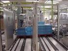 Used Cermex Sidel P922 Gantry Style Palletizer capable of speeds up to 12 cycles per minute. Has 4 axis gripping transfer station. Allen Bradley controls. Unit was installed and never put into produc...