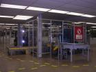 Used Columbia Okura 4 Axis Robotic Style Full Case or Bag Palletizer, Model A730. Capable of speeds up to 550 CPH or 700 BPH. Load capacity: rated 176 lb or 80 Kg, max 260 lb or 120 Kg. Has AB PLC co...