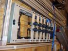 Used Columbia Okura 4 Axis Robotic Style Full Case or Bag Palletizer, Model A730. Capable of speeds up to 550 CPH or 700 BPH. Load capacity: rated 176 lb or 80 Kg, max 260 lb or 120 Kg. Has AB PLC co...