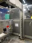 Used Marchesini Model MCP840 Combination Case Packer and Palletizer