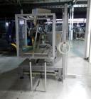 Used Pester Robotic Palletizer, Model PEWO-FORM PAL6. Rated speeds up to 15 packs/minute, with Kuka 5 axis robot, type KRC1, rated 162 KG, 480 volt, serial# 18049, built 2002, Pester serial# 10487C, ...