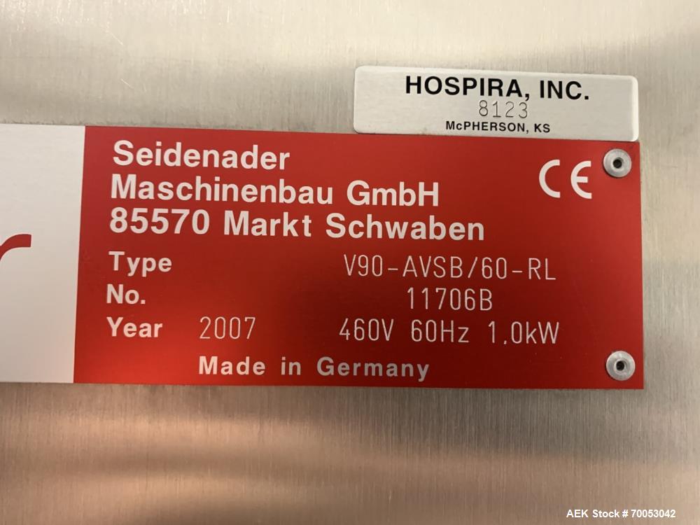 Used Unused Seidenader inspection system, with (2) type V90-AVSB/60 Seidenader semi automatic inspection units, (1) L-R unit, (1) R-L unit, currently set up for syringe inspection, with Sortec feedin...