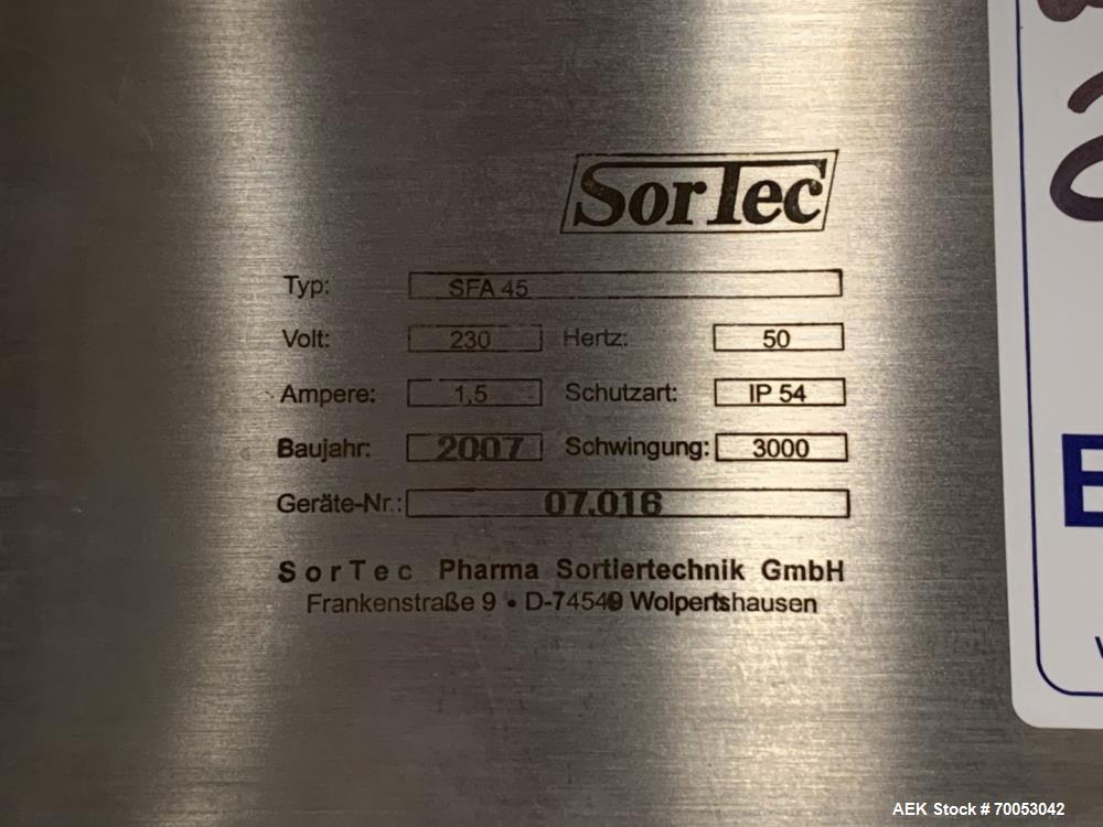 Used Unused Seidenader inspection system, with (2) type V90-AVSB/60 Seidenader semi automatic inspection units, (1) L-R unit, (1) R-L unit, currently set up for syringe inspection, with Sortec feedin...