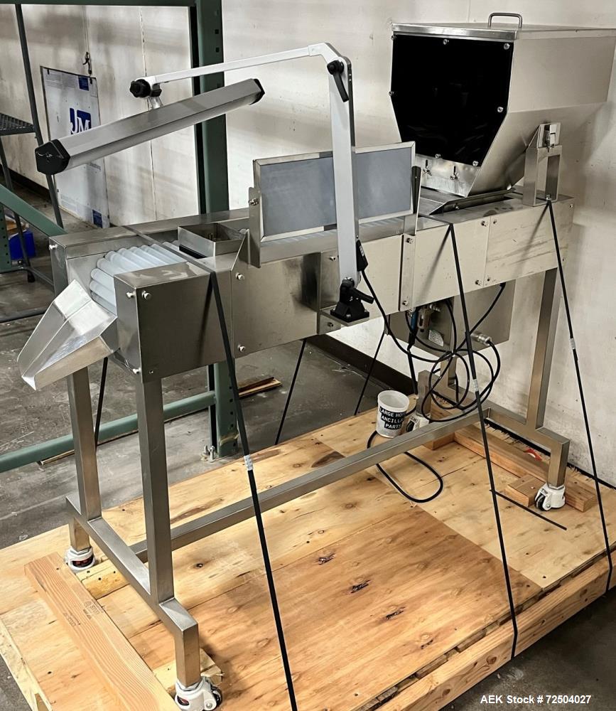 Used CapPlus Technologies (CPT) Roller Inspection Table, Model Pharmaspec. Features pharmaceutical-grade stainless steel construction and is rated for up to 200,000 pieces per hour (depending on prod...
