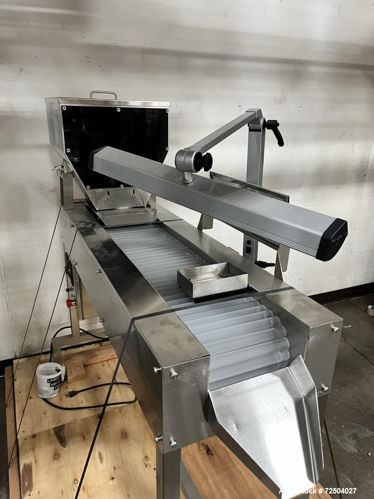 Used CapPlus Technologies (CPT) Roller Inspection Table, Model Pharmaspec. Features pharmaceutical-grade stainless steel construction and is rated for up to 200,000 pieces per hour (depending on prod...