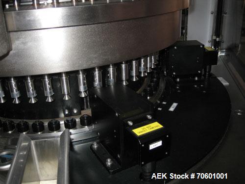 Used Eisai Sterile Rotary Vial Inspection Unit, Model 125-596.Designed for speeds up to 300 vials/minute,designed for 2, 5 and 10 ml vials for clear and suspension type products, 30 mm max diameter x...